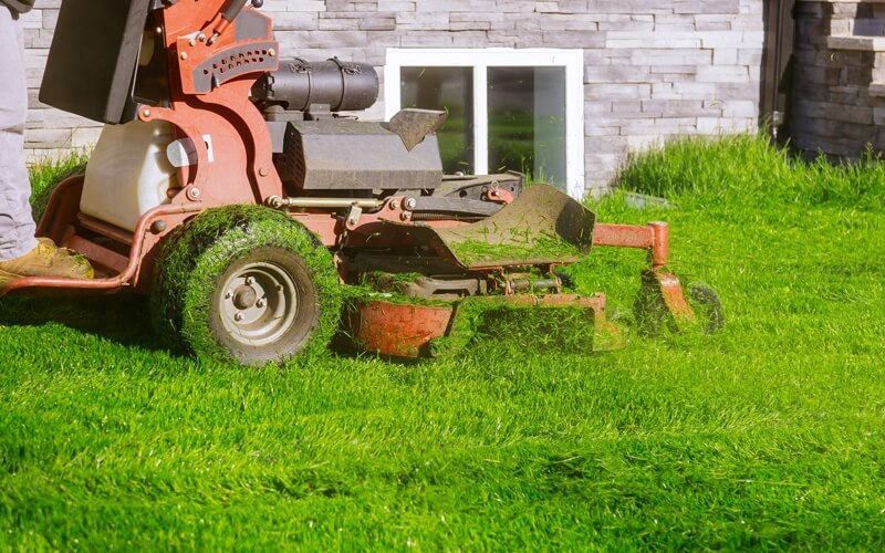 Mowing Lawn for Lawn Care Maintenance Metrowest Boston, MA